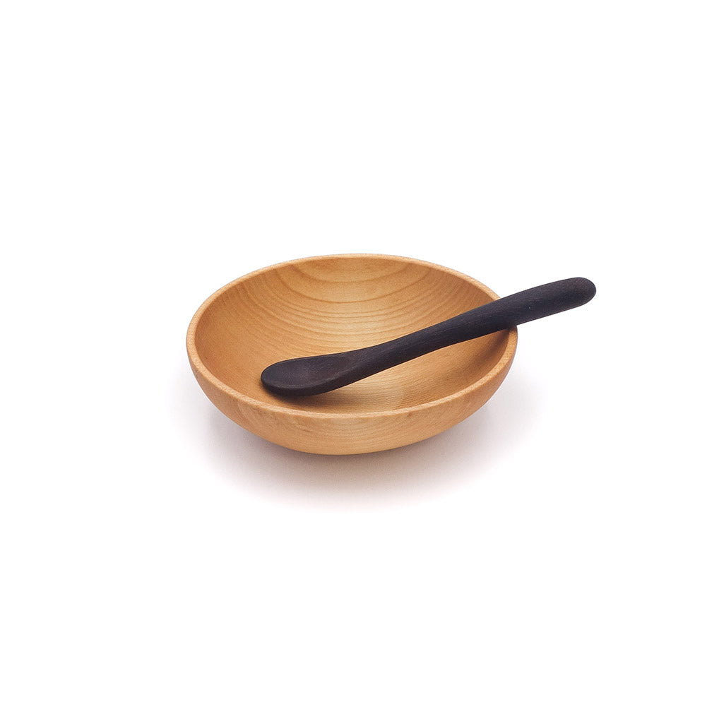 small wood bowl with wooden spoon