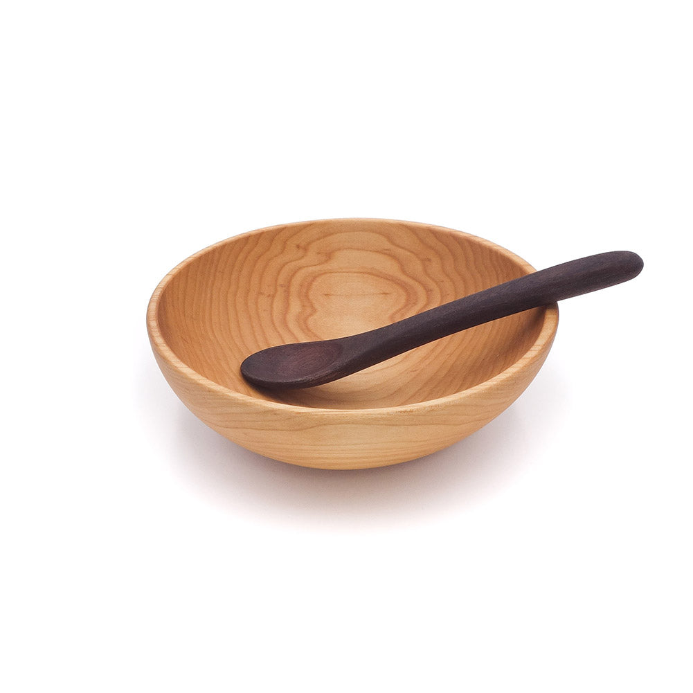 small wood bowl with small wooden spoon