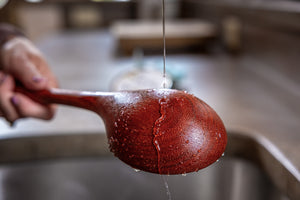 water beading off a waxed ladle