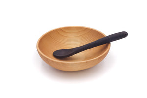 small wood bowl with wooden spoon