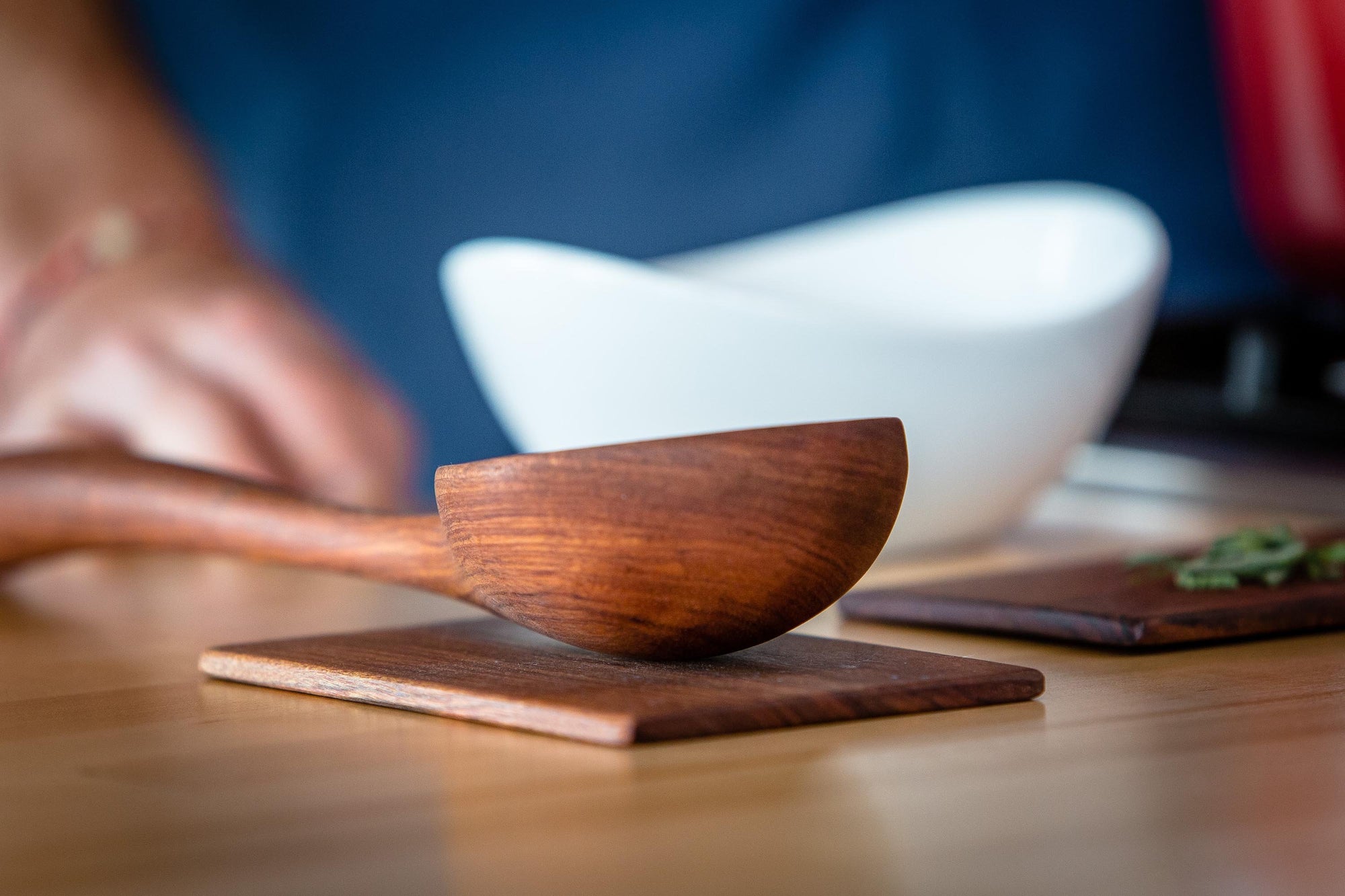 big hardwood ladle sitting on spoon rest - Earlywood