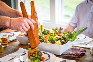 using a wood spatula set to serve salad - Earlywood